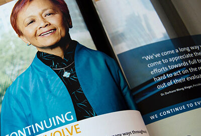 Interior spread of the Canadian Agency for Drugs and Technologies in Heath annual report featuring a photo of a woman wearing a blue blazer