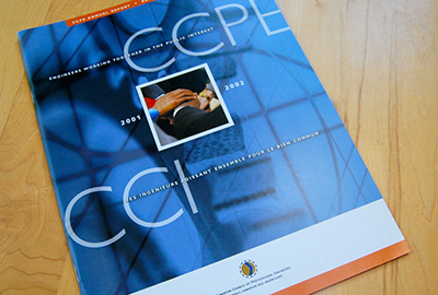Cover of a Canadian Counsel of Professional Engineers annual report featuring an image of a blue 3D globe with an inset of several hands coming together