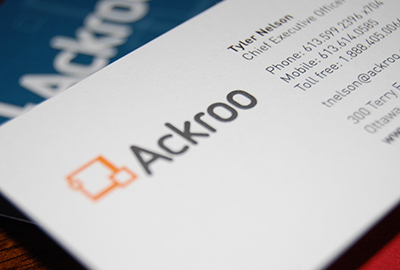 A close up of a Ackroo business card