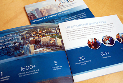 Dark blue cover and interior spread of a brochure for The International Conference on Residency Education featuring photos of Halifax
