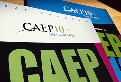 Bold black and bright coloured brochure covers for the 2010 Canadian Association of Emergency Physicians conference